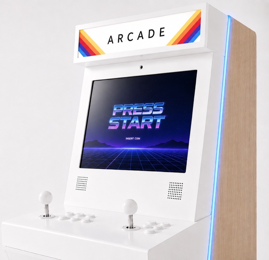 A premium white arcade machine with a retro rainbow ARCADE marquee, light-oak side panel, subtle blue LED edge lighting, and a Press Start screen, photographed on a clean studio background.